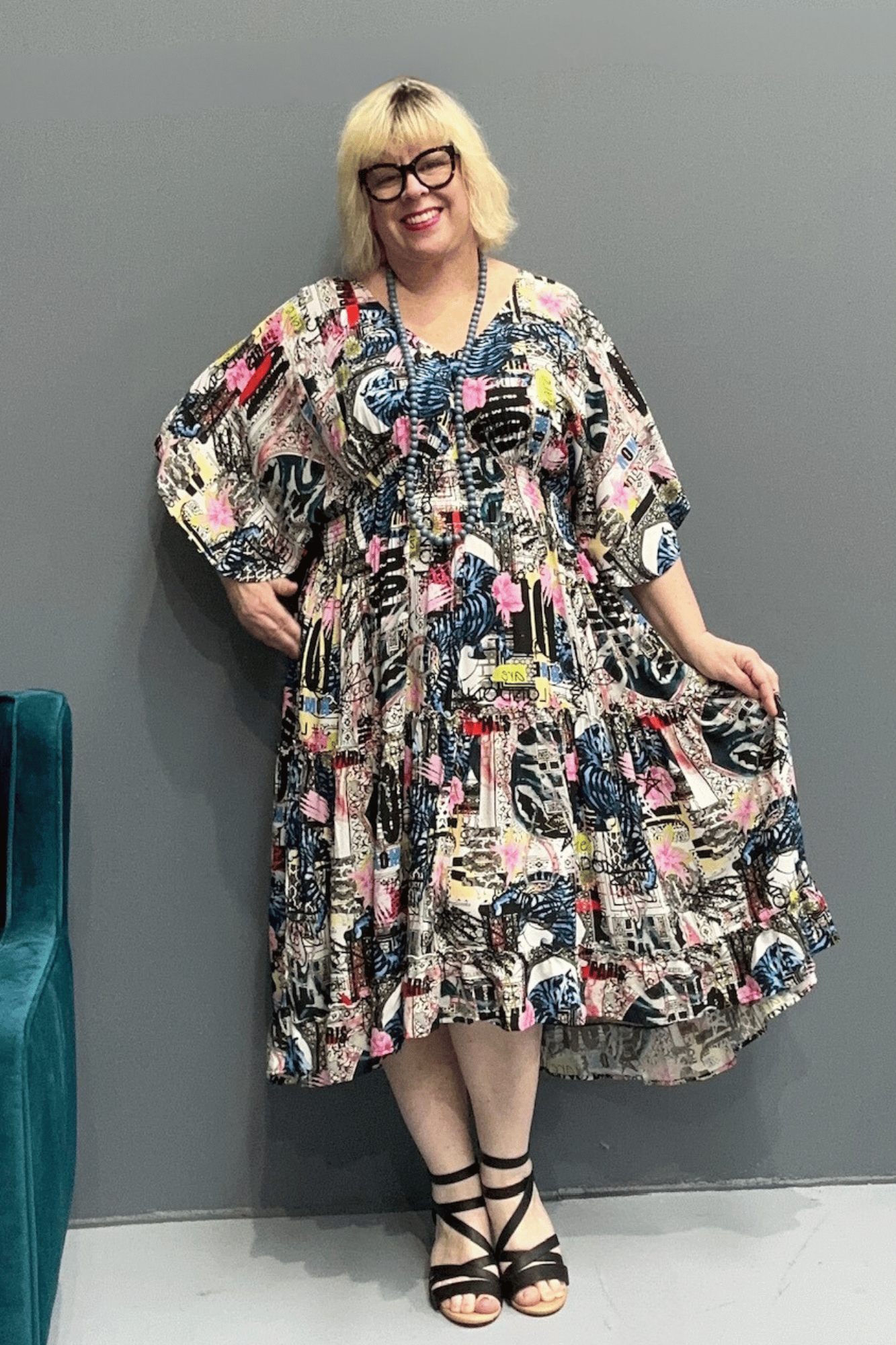 Floaty, tiered plus size dress for beach or casual outings, featuring a comfortable fit and versatile styling options.