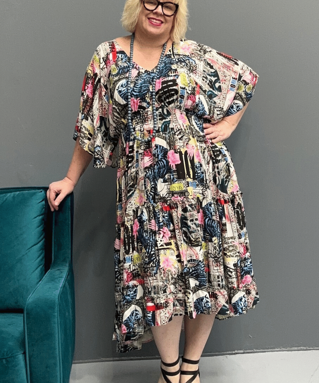 Floaty, tiered plus size dress for beach or casual outings, featuring a comfortable fit and versatile styling options.