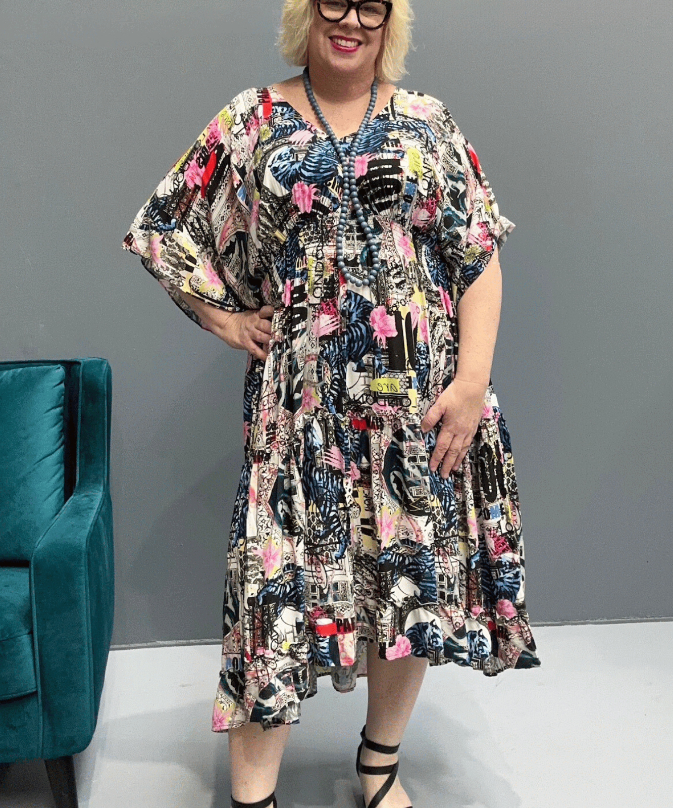 Floaty, tiered plus size dress for beach or casual outings, featuring a comfortable fit and versatile styling options.