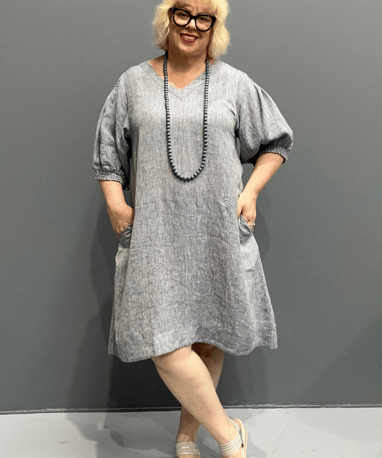 Plus size 'HAYLEY' dress with flowing silhouette and balloon sleeves for comfort on warm days.