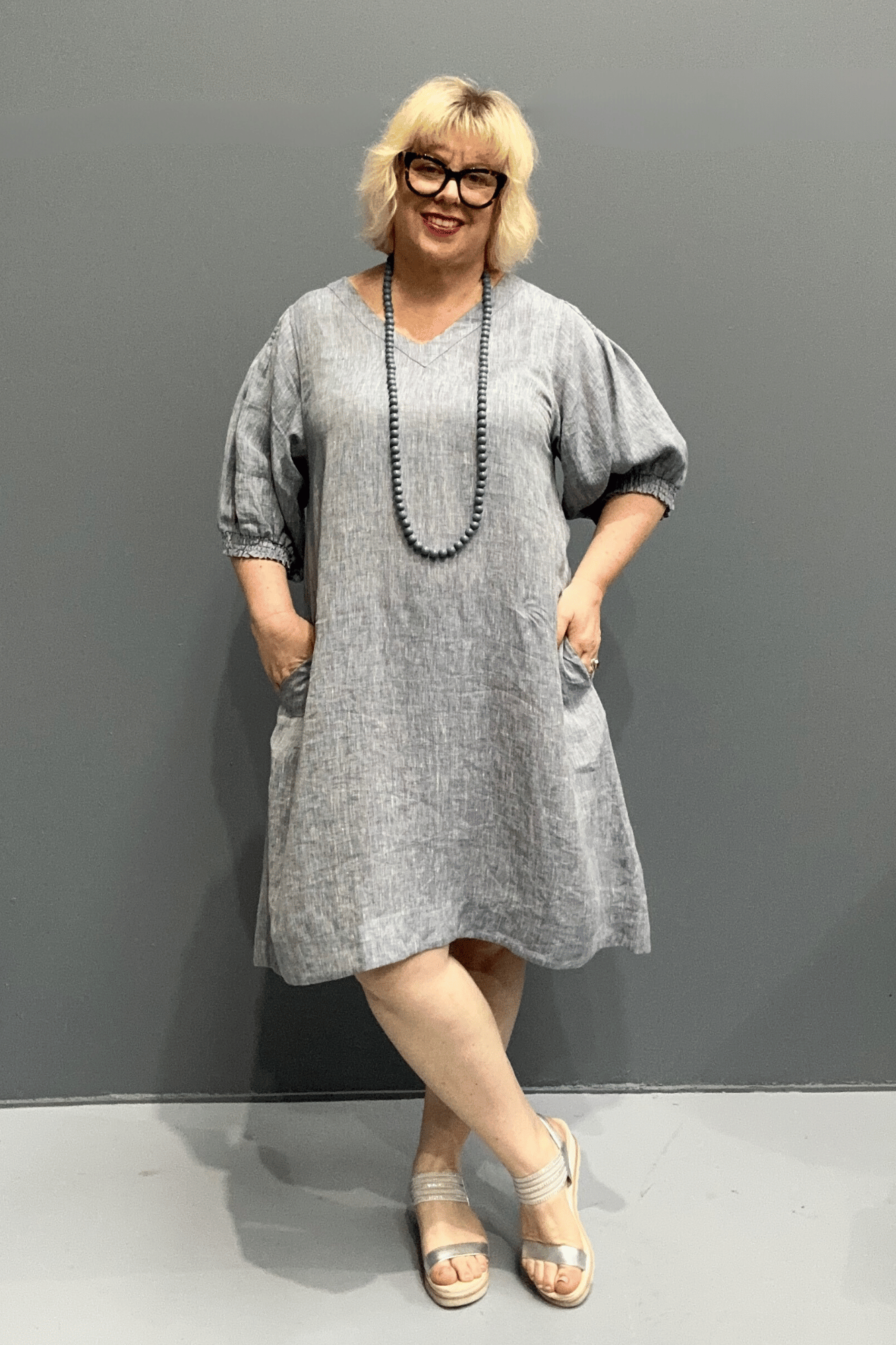 Plus size 'HAYLEY' dress with flowing silhouette and balloon sleeves for comfort on warm days.