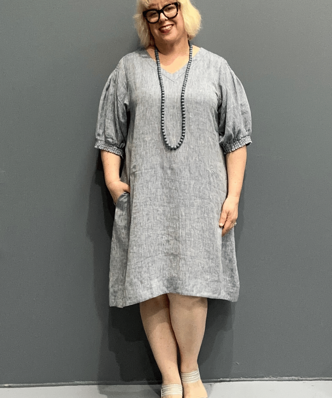 Plus size 'HAYLEY' dress with flowing silhouette and balloon sleeves for comfort on warm days.