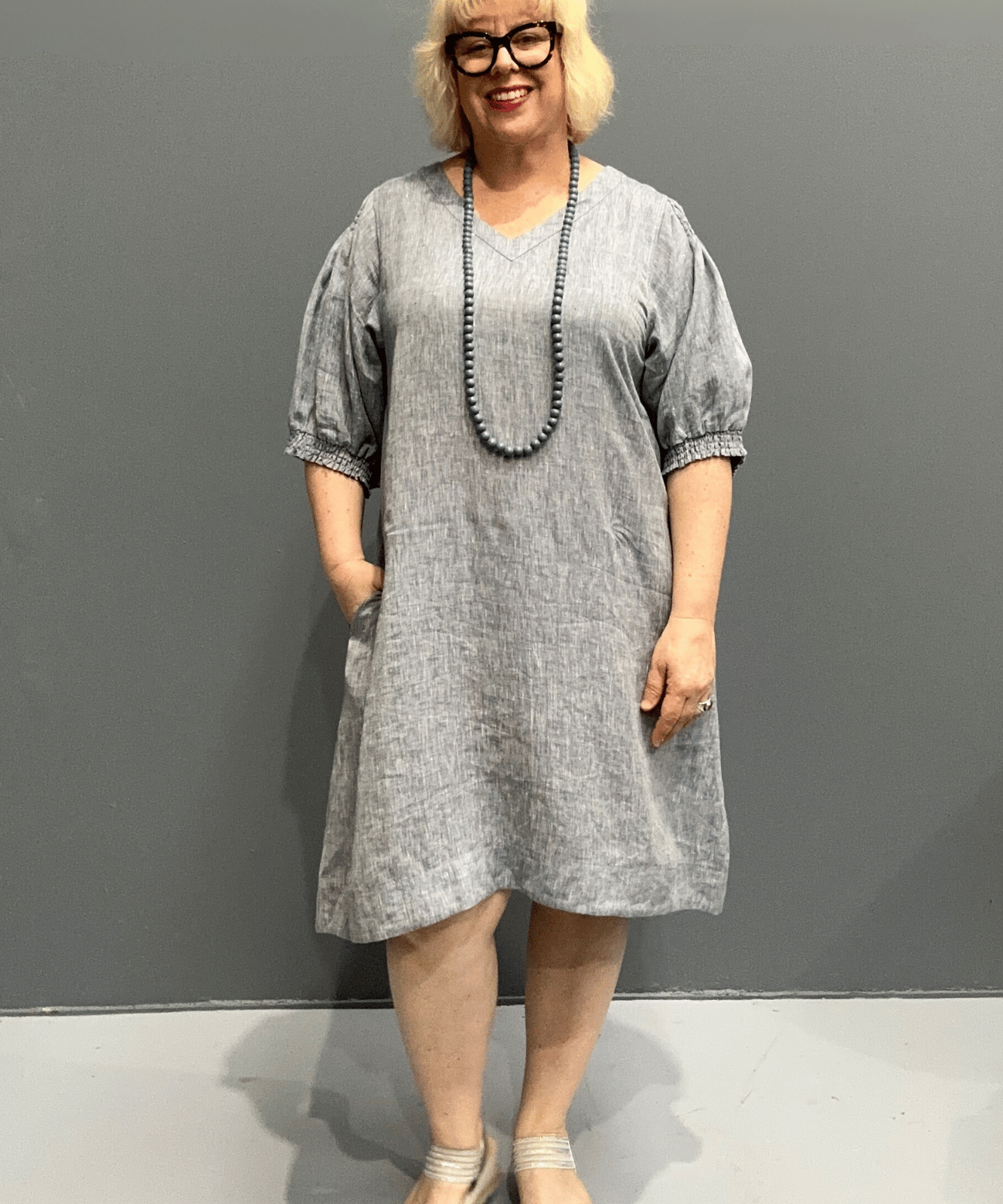 Plus size 'HAYLEY' dress with flowing silhouette and balloon sleeves for comfort on warm days.