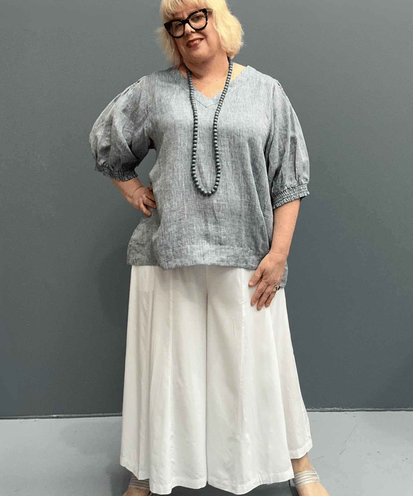 'Holly' plus size linen top with a high-low hem, balloon sleeves, and dropped armholes for comfort and airflow.