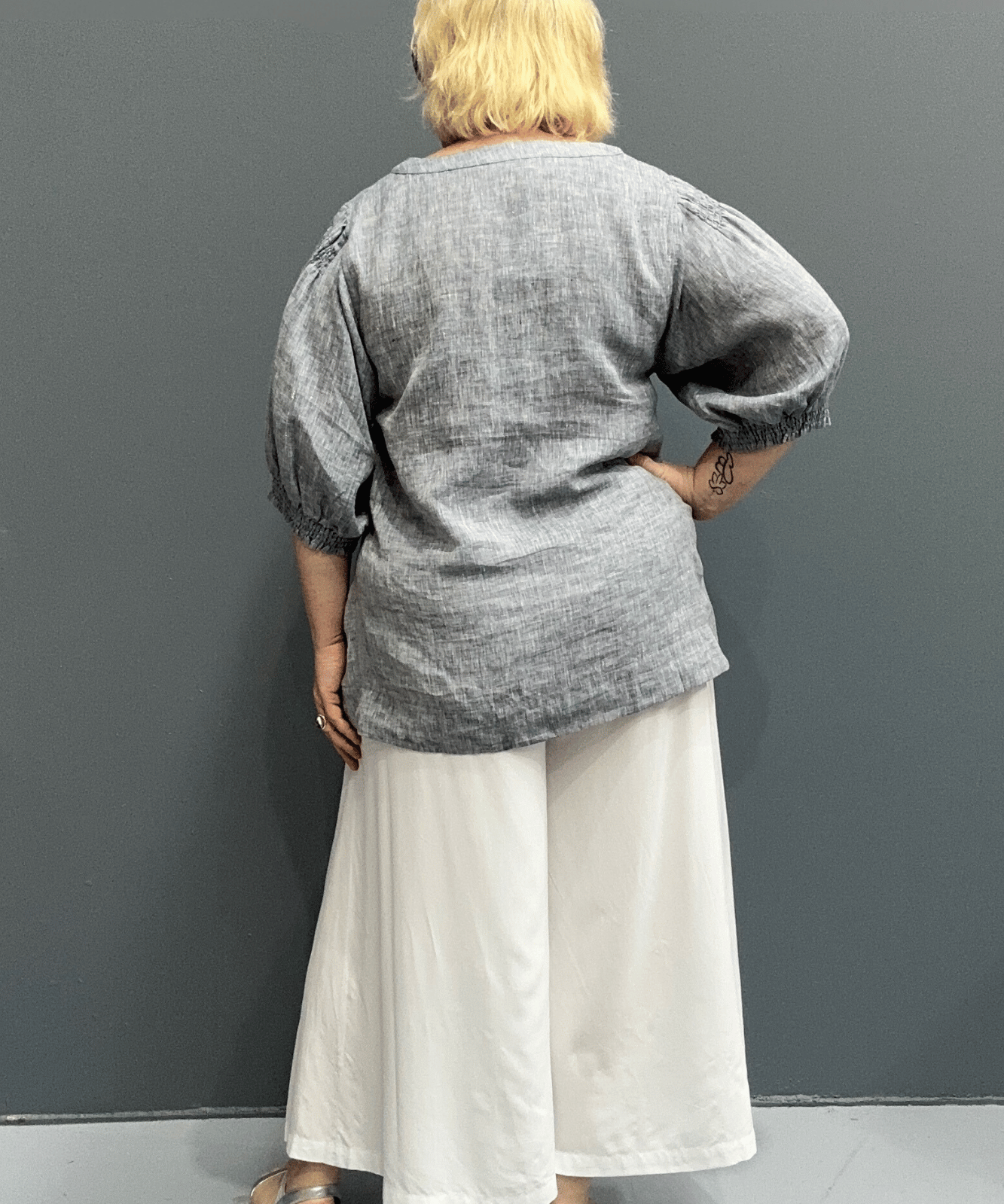 'Holly' plus size linen top with a high-low hem, balloon sleeves, and dropped armholes for comfort and airflow.