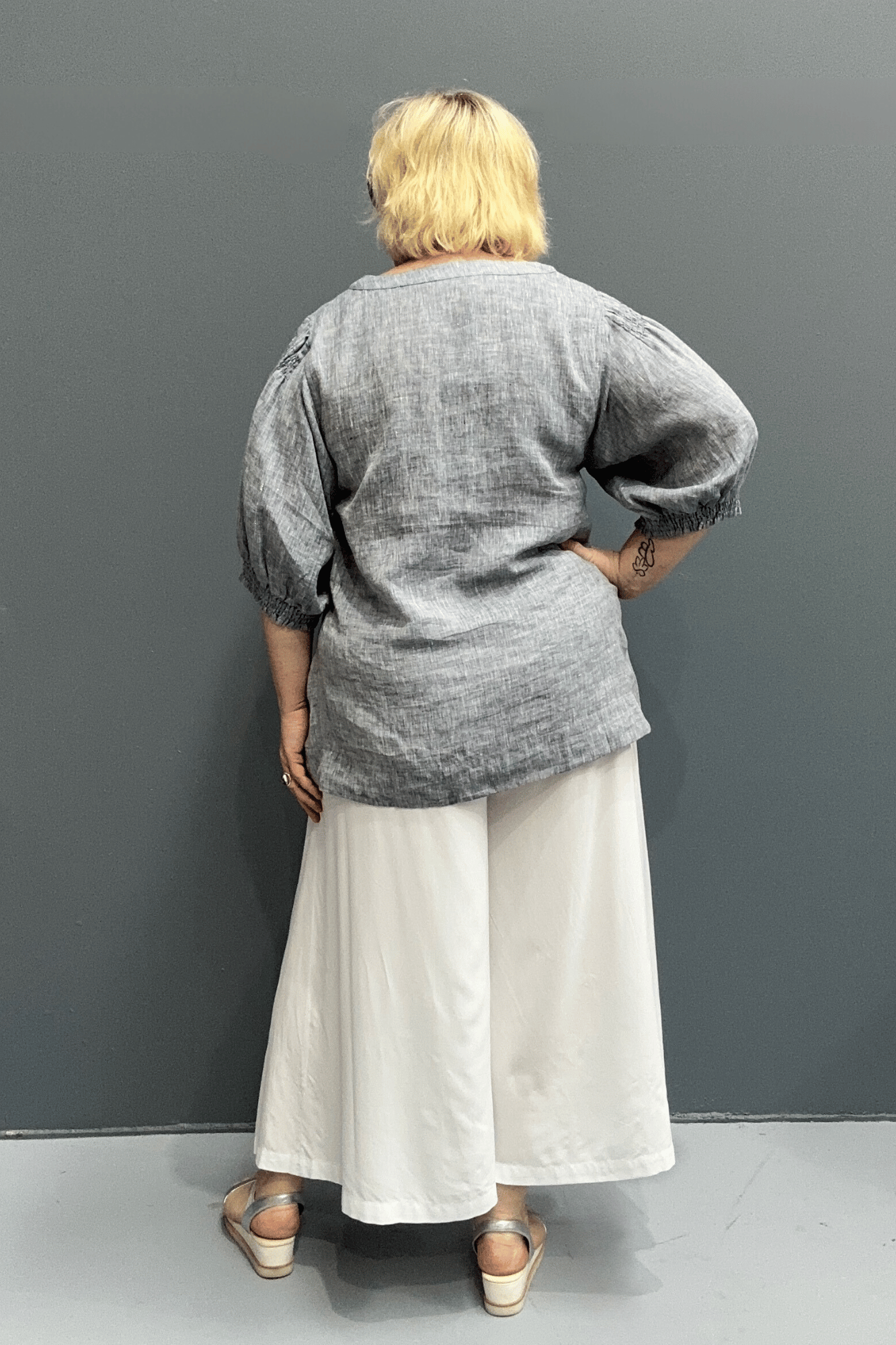 'Holly' plus size linen top with a high-low hem, balloon sleeves, and dropped armholes for comfort and airflow.