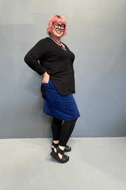 Plus size 'ADDICTED' long sleeve top with scoop neckline, side splits, and long sleeves