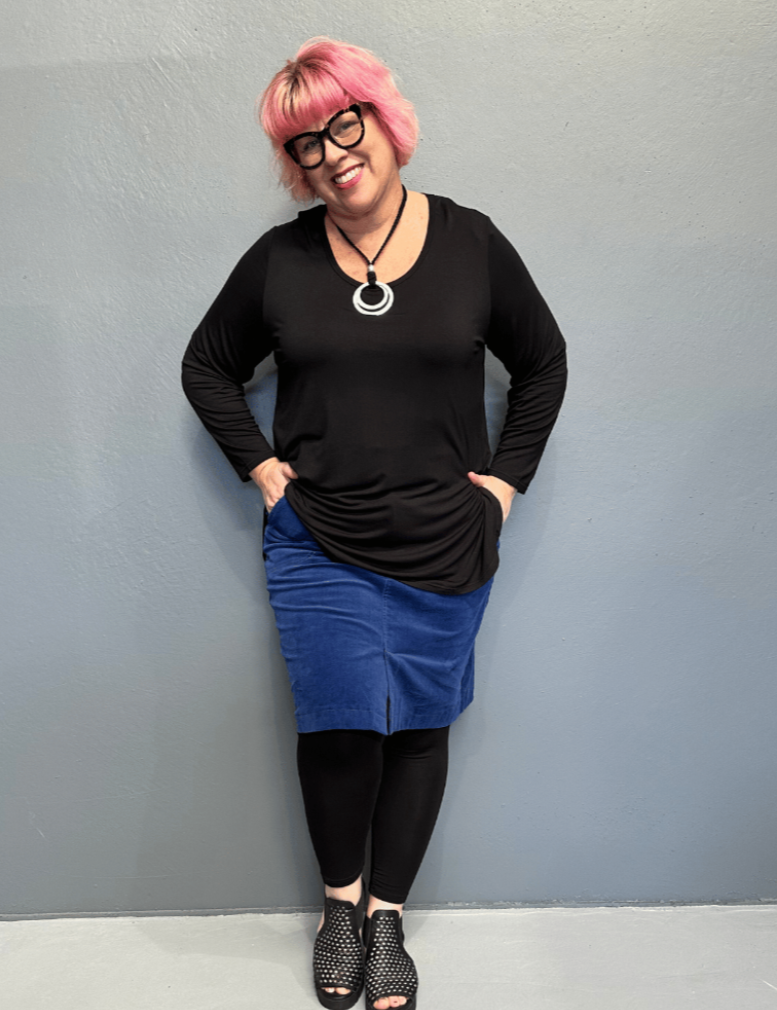 Plus size 'ADDICTED' long sleeve top with scoop neckline, side splits, and long sleeves