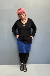 Plus size 'ADDICTED' long sleeve top with scoop neckline, side splits, and long sleeves