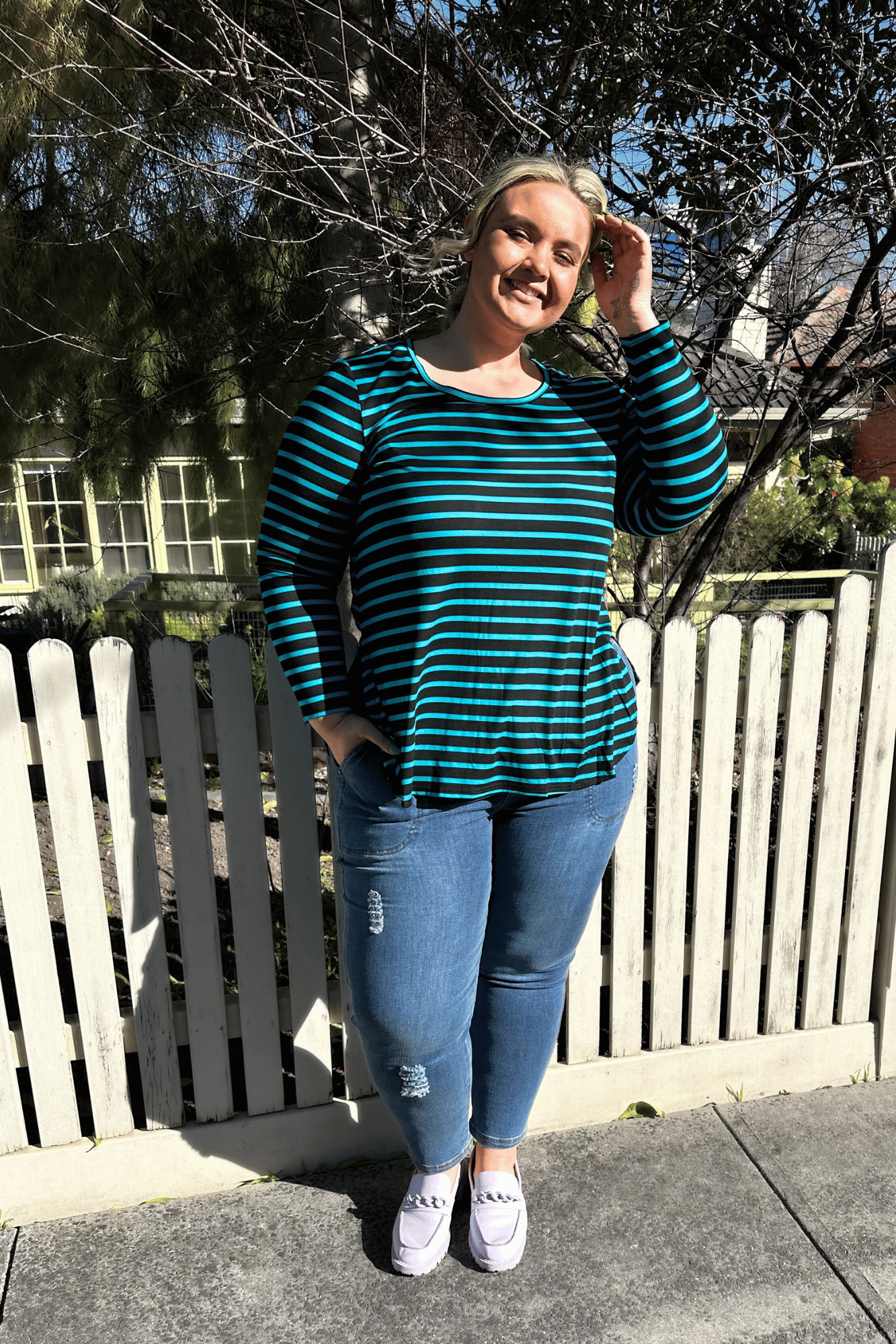 'ADDICTED' long sleeve top, perfect for layering with cords, skirts, and overalls in plus size fashion.