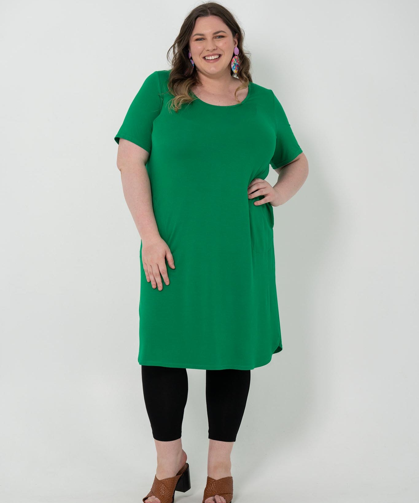 Plus size 'Alana' T-shirt dress in green, featuring a lightweight and breathable design for everyday comfort and classic style.