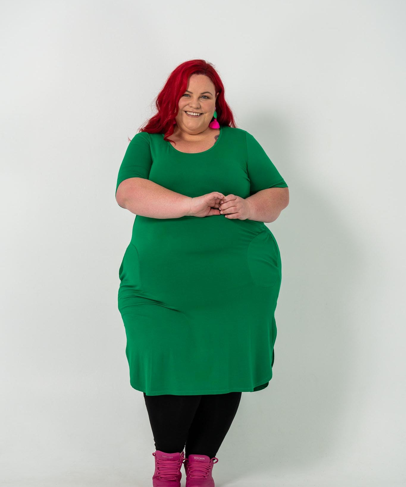 Plus size 'Alana' T-shirt dress in green, featuring a lightweight and breathable design for everyday comfort and classic style.