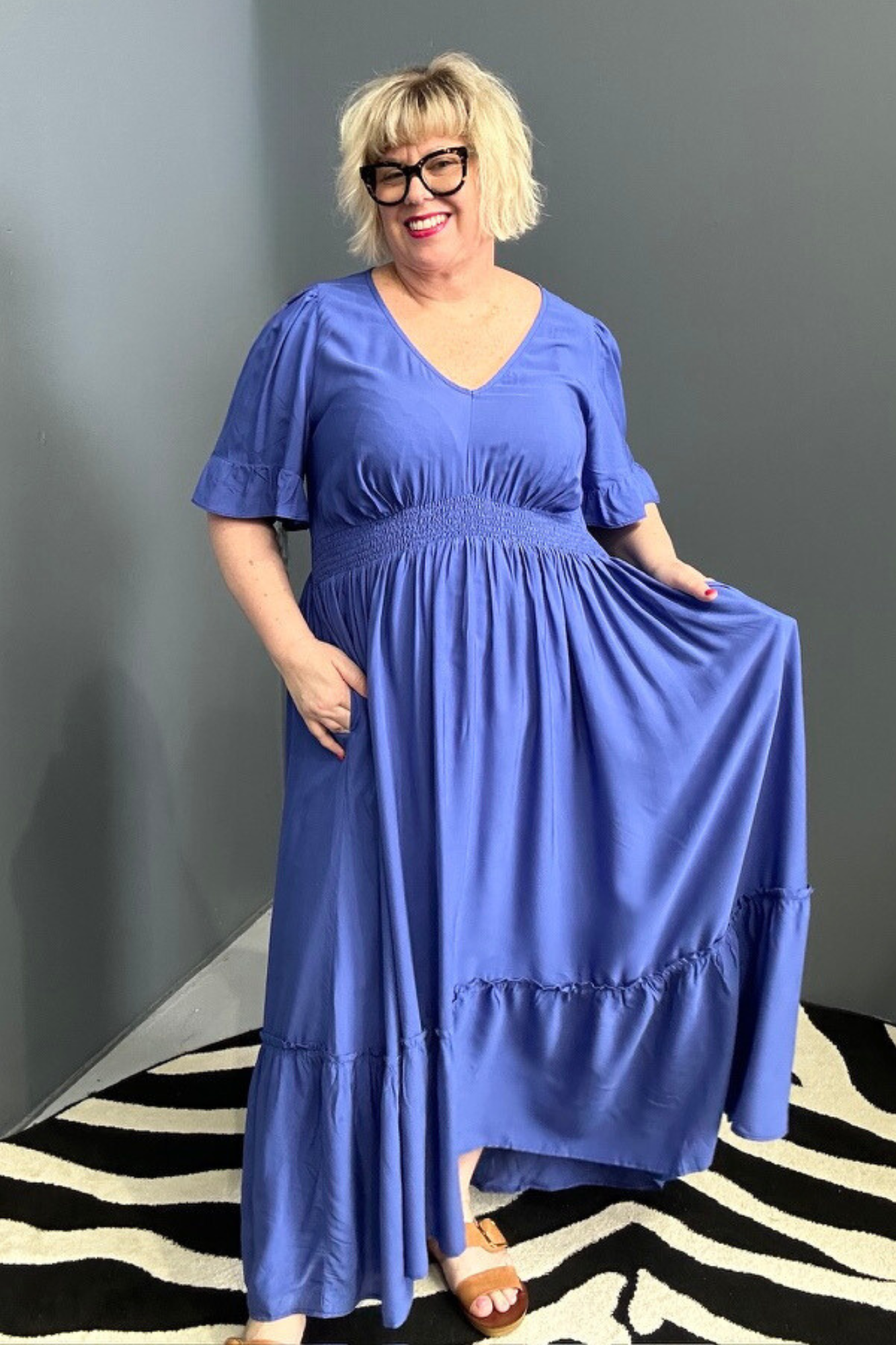 Plus-size cobalt maxi dress with a soft, flowing silhouette.