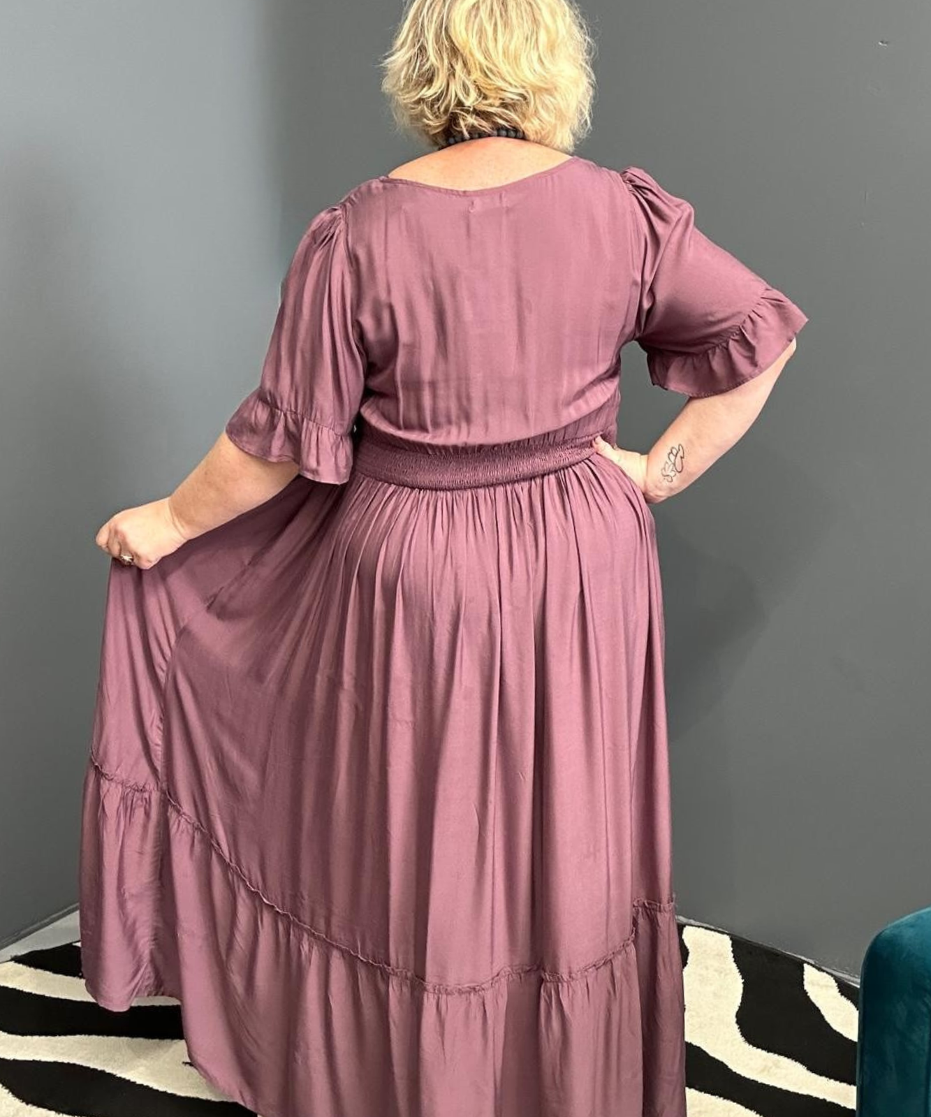 Plus-size mulberry maxi dress with a soft, flowing fit.