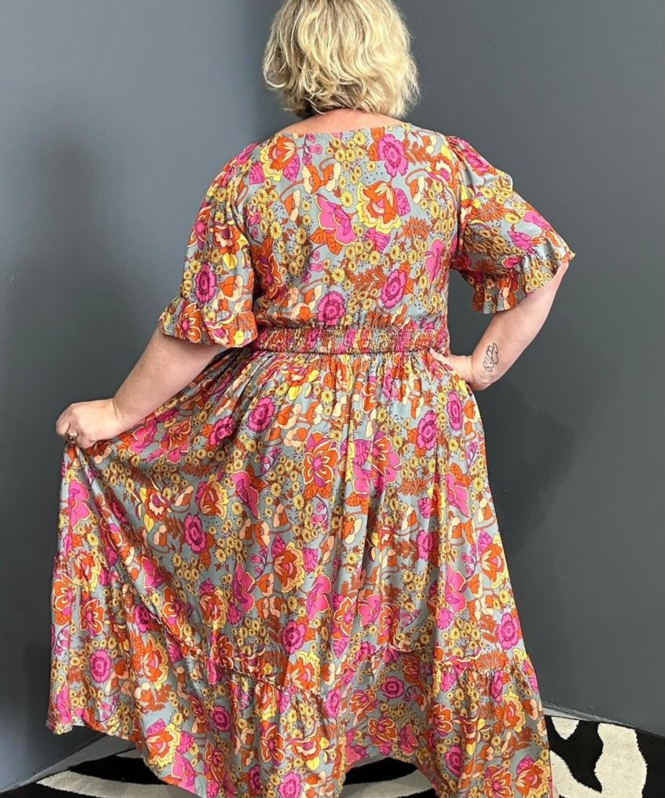 Plus-size sage green maxi dress with a soft, flowing fit.