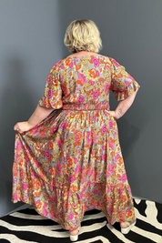 Plus-size sage green maxi dress with a soft, flowing fit.