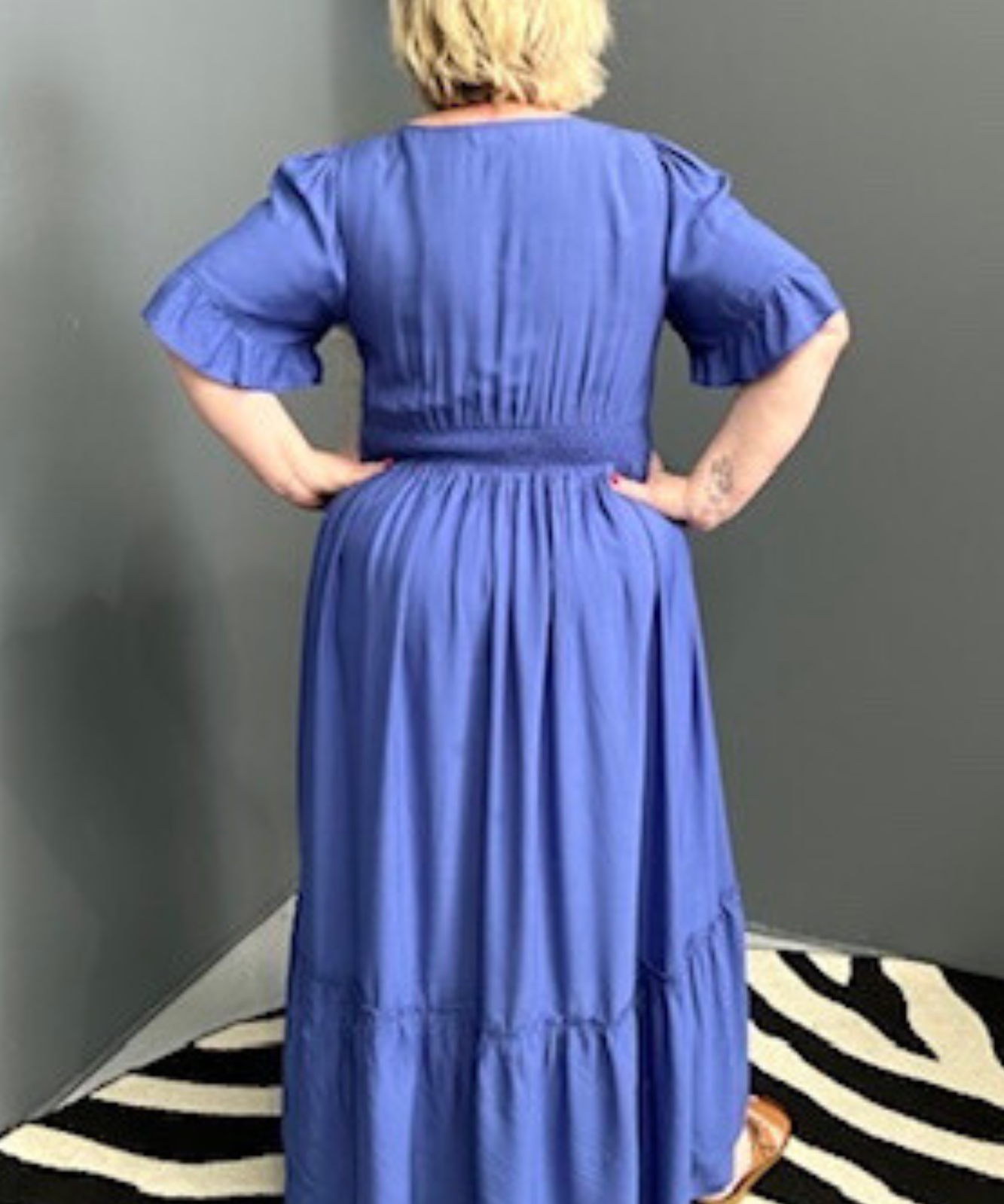 Plus-size cobalt maxi dress with a soft, flowing silhouette.