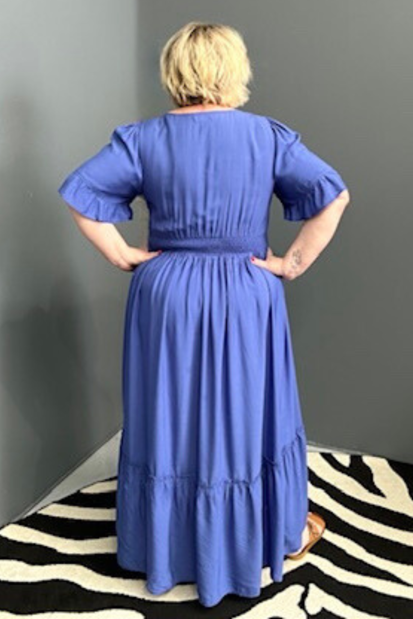 Plus-size cobalt maxi dress with a soft, flowing silhouette.