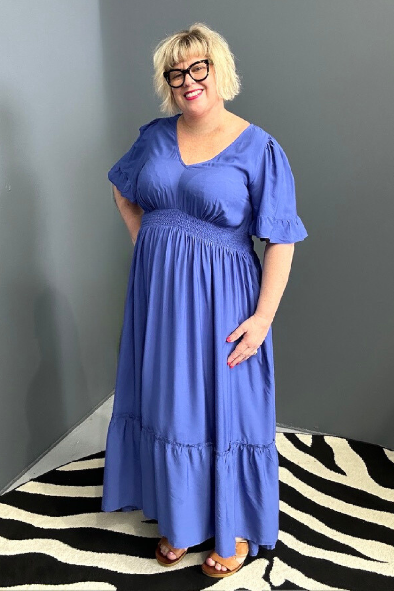 Plus-size cobalt maxi dress with a soft, flowing silhouette.