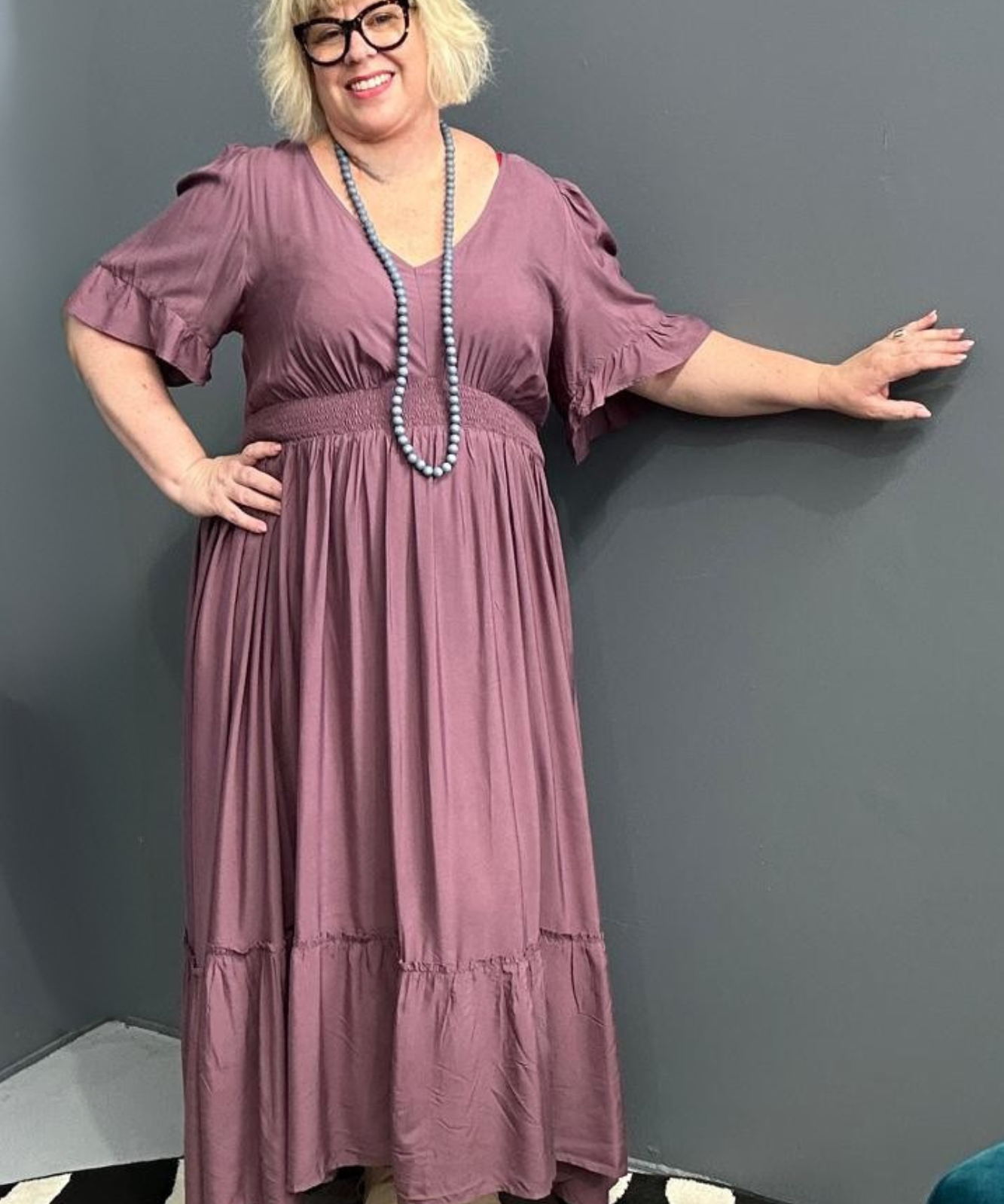 Plus-size mulberry maxi dress with a soft, flowing fit.
