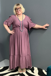 Plus-size mulberry maxi dress with a soft, flowing fit.