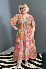 Plus-size sage green maxi dress with a soft, flowing fit.