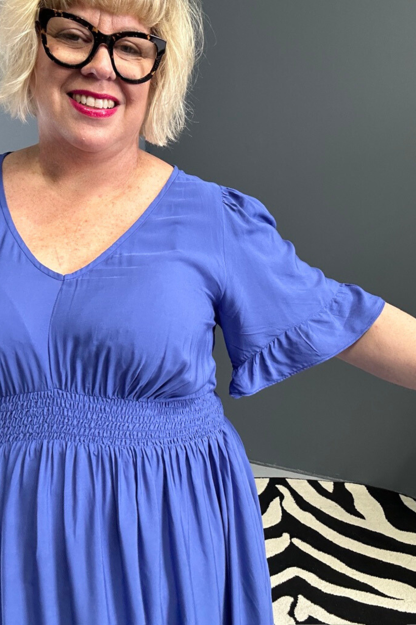 Plus-size cobalt maxi dress with a soft, flowing silhouette.