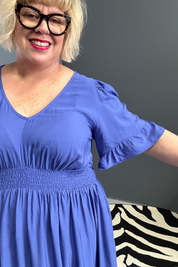 Plus-size cobalt maxi dress with a soft, flowing silhouette.