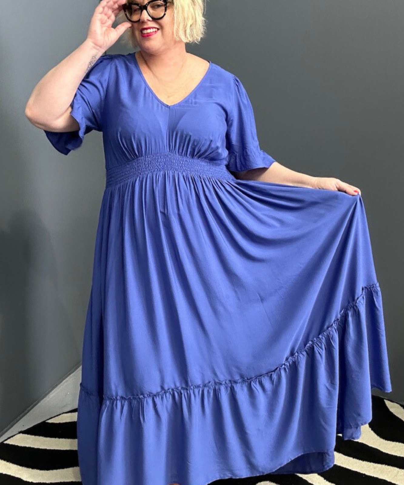 Plus-size cobalt maxi dress with a soft, flowing silhouette.