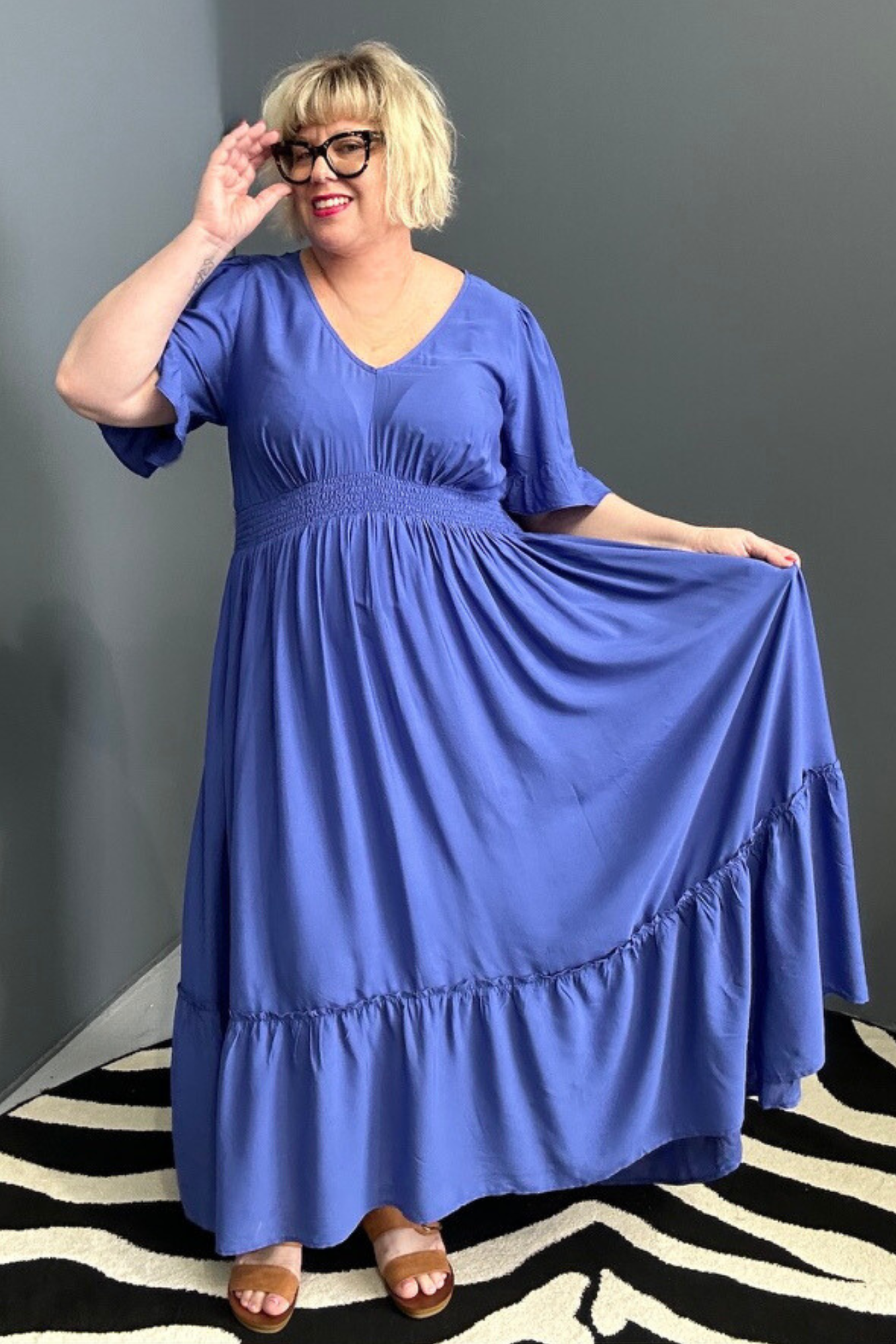 Plus-size cobalt maxi dress with a soft, flowing silhouette.