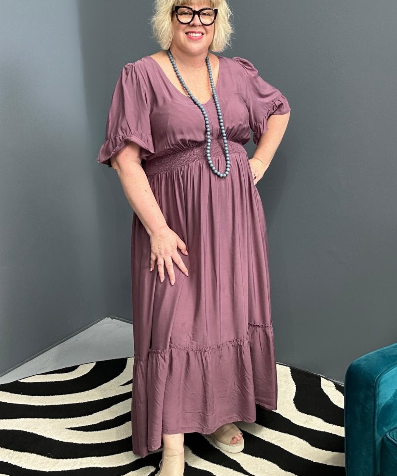Plus-size mulberry maxi dress with a soft, flowing fit.