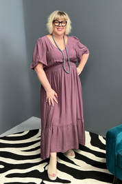 Plus-size mulberry maxi dress with a soft, flowing fit.