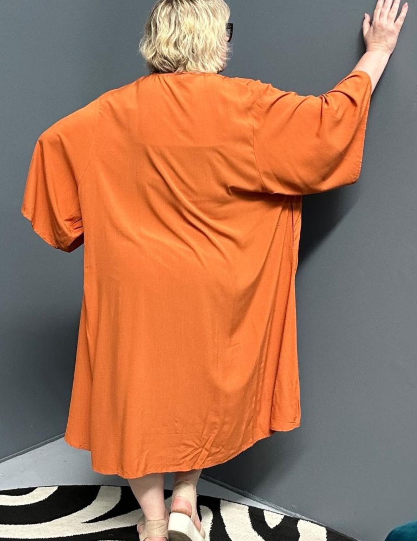 Flowy kimono duster in a deep rust shade.