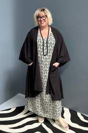 Flowy kimono duster in a sleek black design.