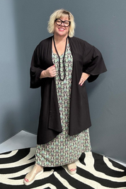 Flowy kimono duster in a sleek black design.