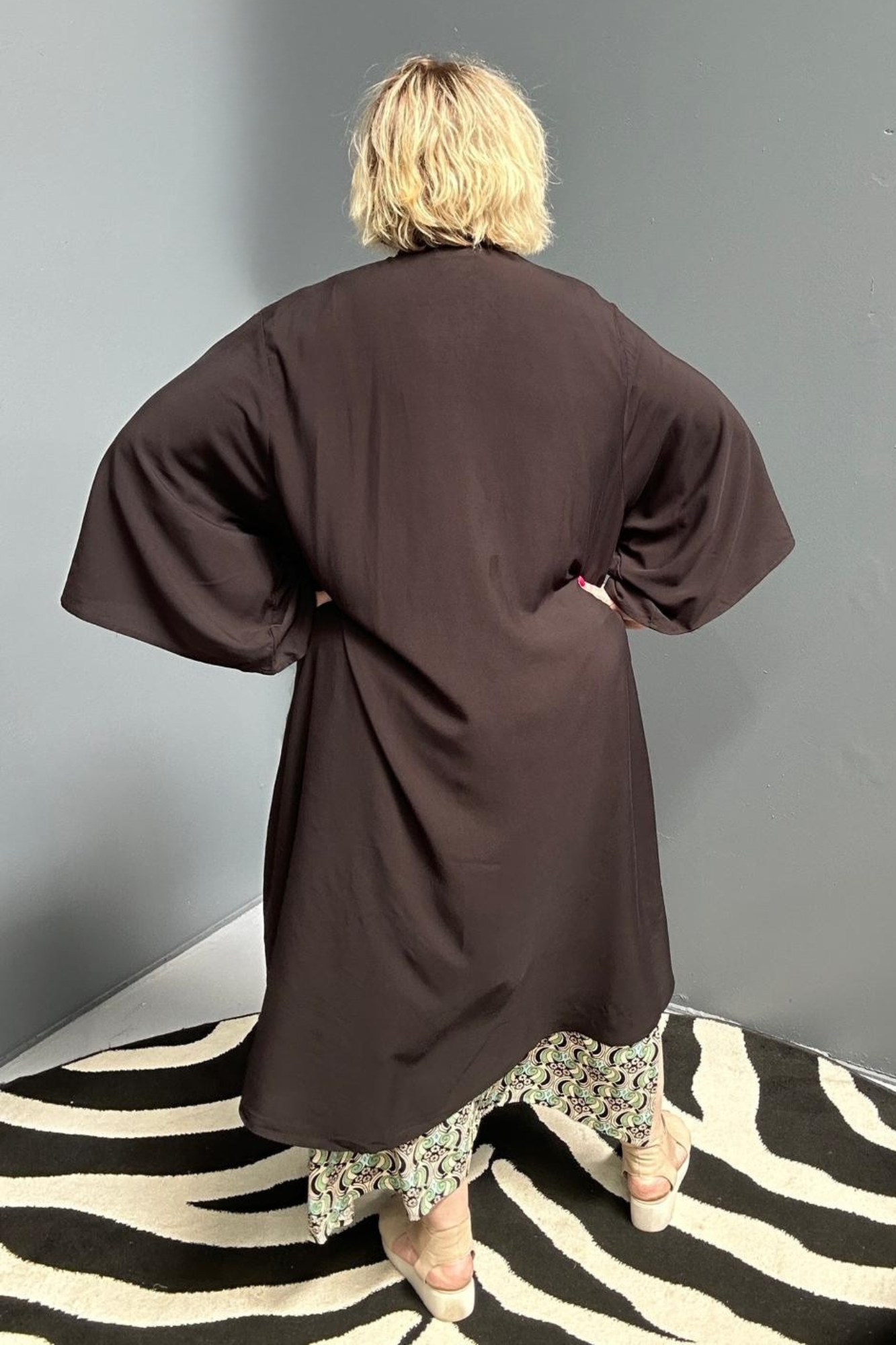 Flowy kimono duster in a sleek black design.