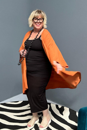 Flowy kimono duster in a deep rust shade.