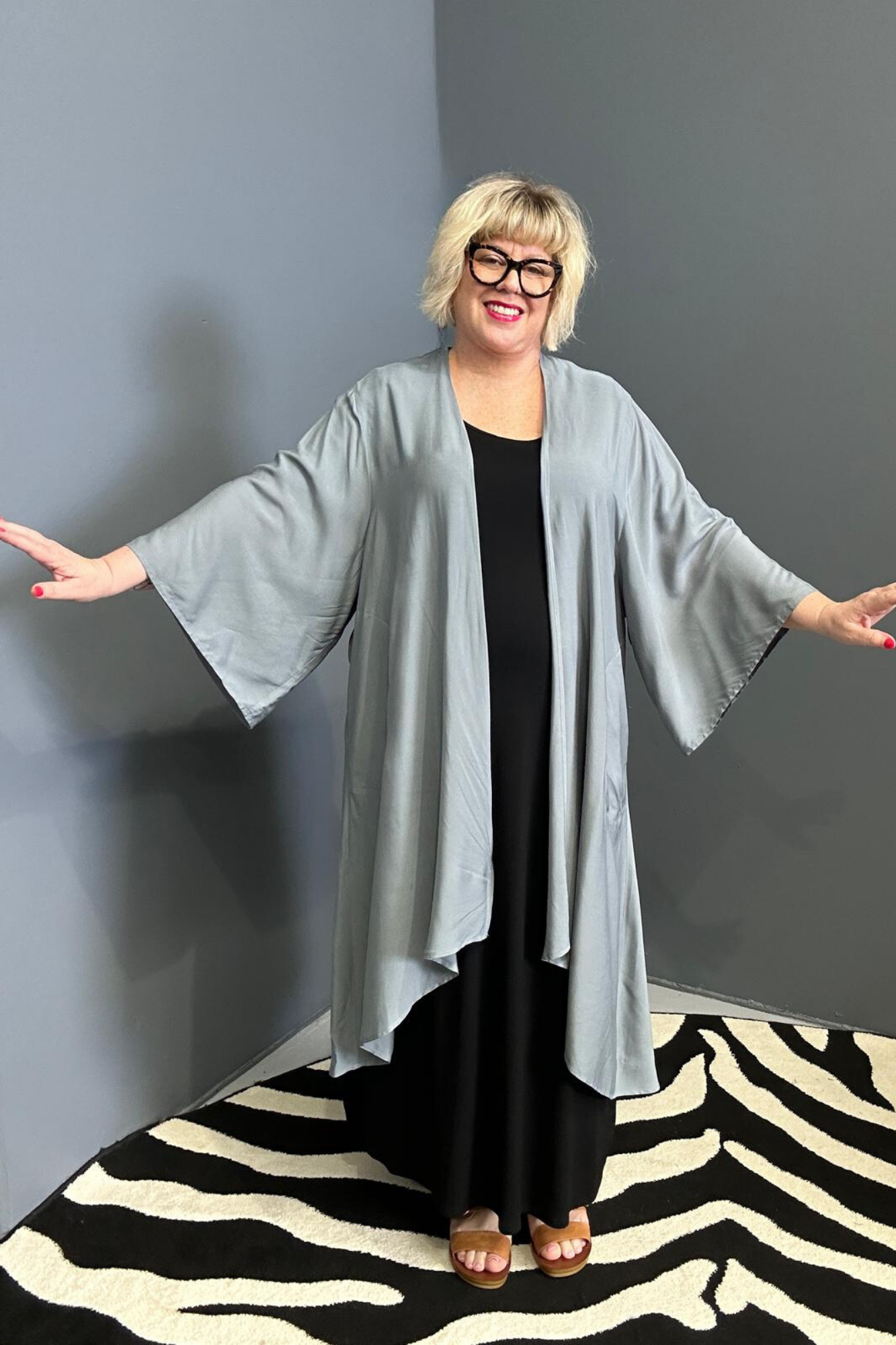 Flowy kimono duster in a calming sage hue.
