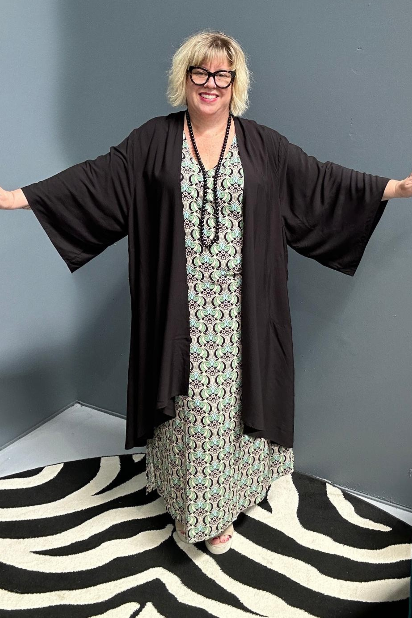Flowy kimono duster in a sleek black design.