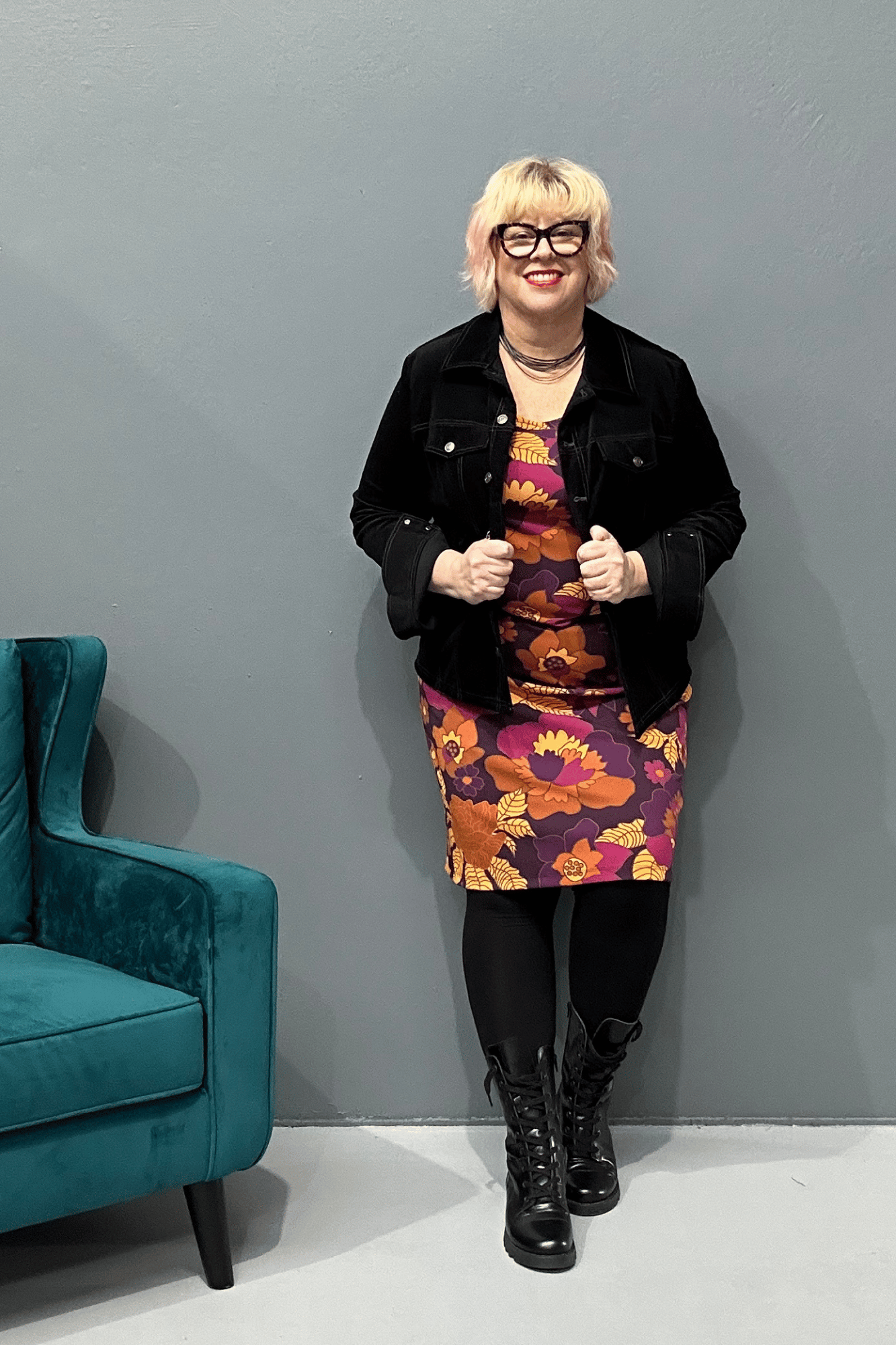 Plus size 'AUDREY' stretch crepe dress with a classic '60s fit, featuring a pink, purple, and caramel retro floral pattern for a stylish look that transitions from work to evening wear.