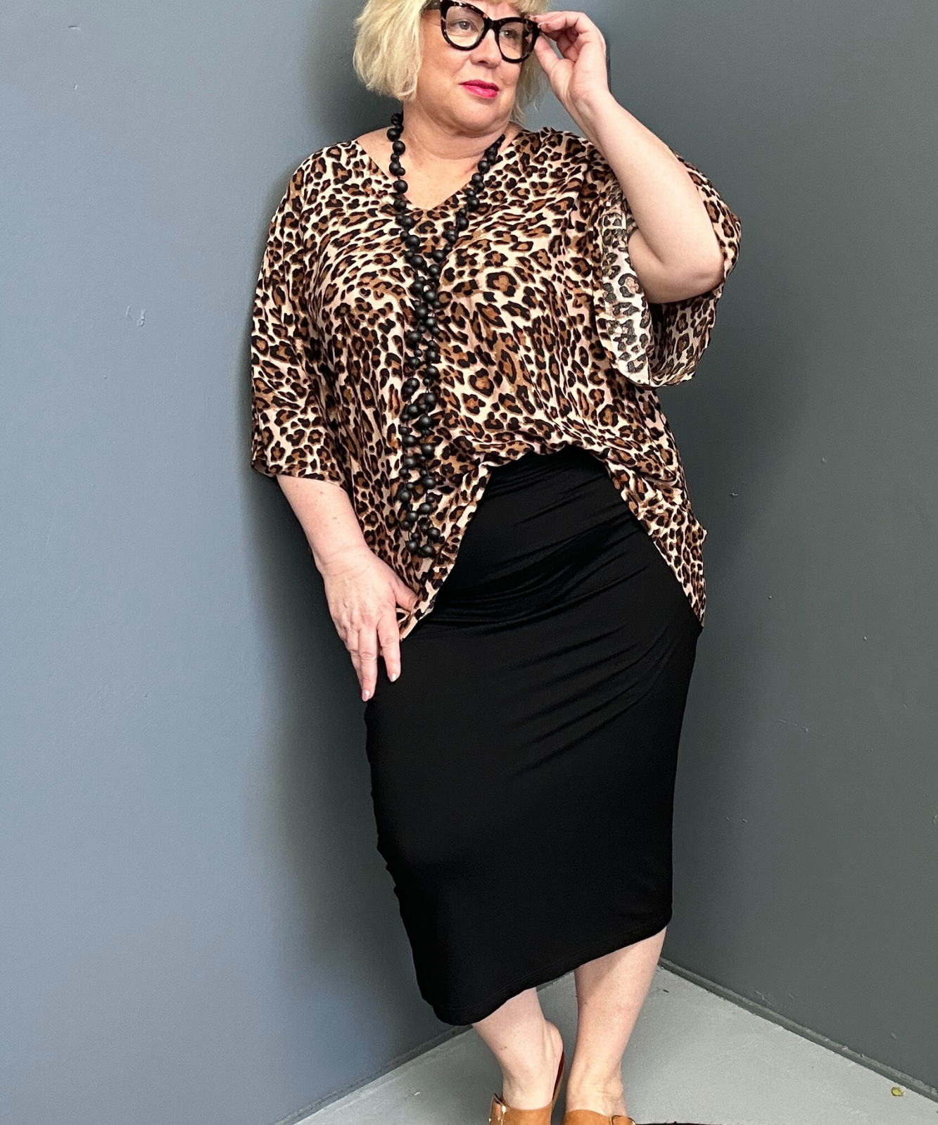 Plus-size black bamboo tube skirt with a soft, stretchy fit.