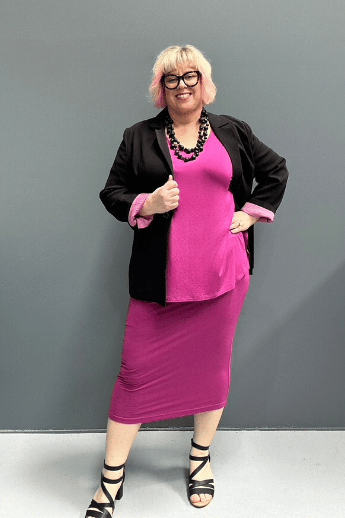 Plus-size fuchsia bamboo tube skirt with a soft, stretchy fit.







