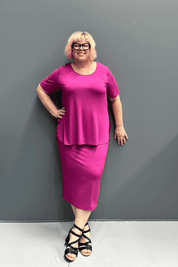 Plus-size fuchsia bamboo tube skirt with a soft, stretchy fit.