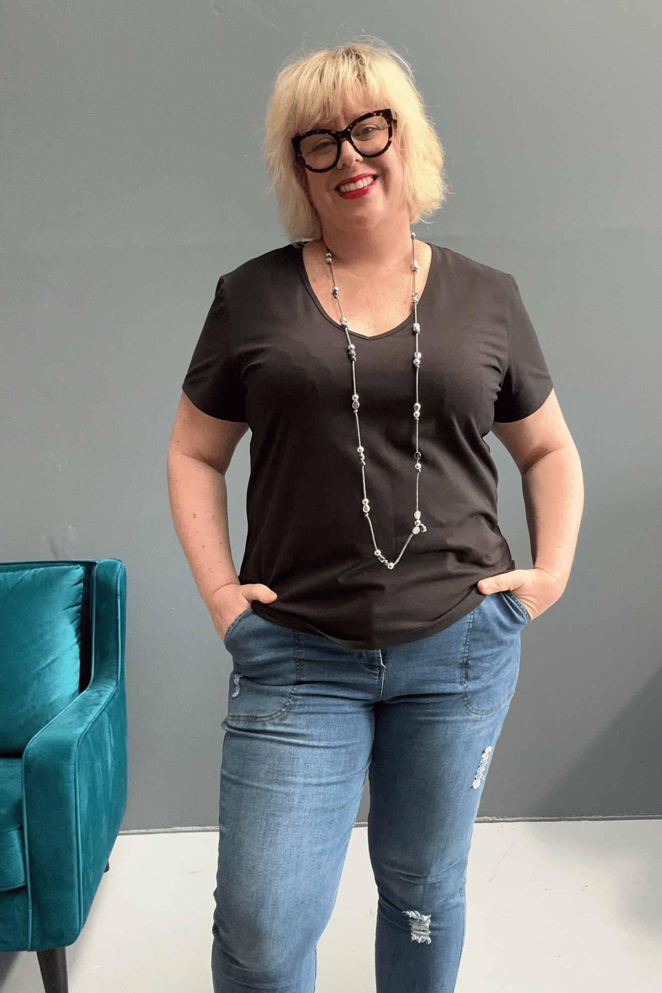 Classic black cotton lycra tee for plus size women, versatile for everyday wear and layering.