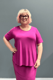 Plus-size fuchsia short-sleeve bamboo top with a relaxed fit.
