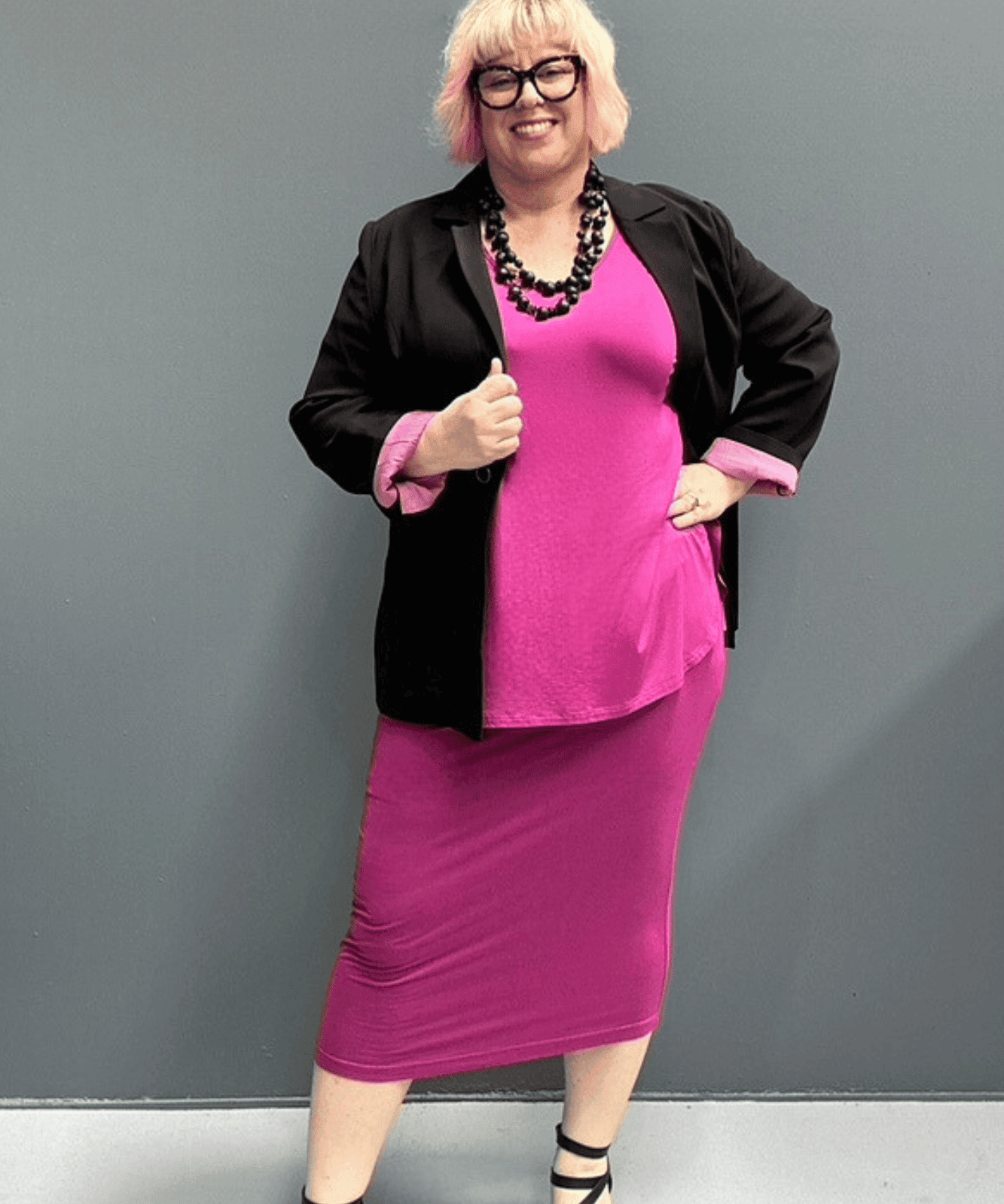 Plus-size fuchsia short-sleeve bamboo top with a relaxed fit.