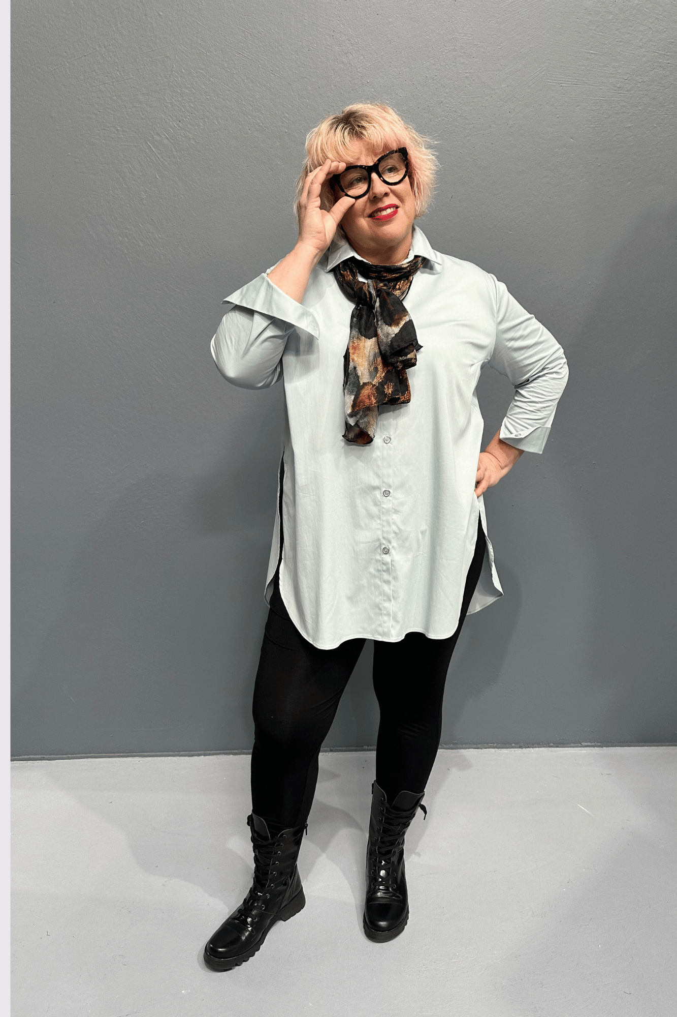 Versatile 'NOT HIS SHIRT' top, styled with 'STELLA' jeans and 'EMBRACE' skirt, perfect for plus size women.