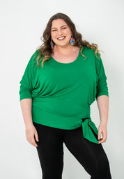 Plus-size Bat Wing Top in Green Tambourine with a stylish batwing cut and adjustable side ties for a customized fit.