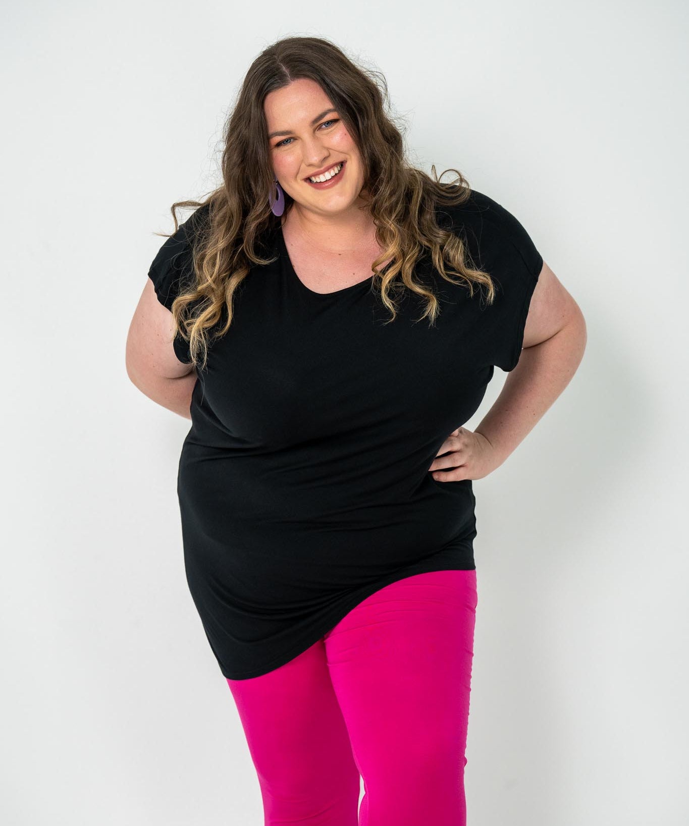 'Jazz' Asymmetric top with a trendy hem, soft fabric, perfect for plus size women. Pairs well with jeans or skirts for casual or evening wear.