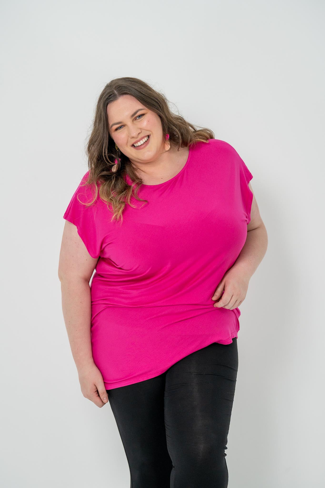 'Jazz' Asymmetric Top in plus size, featuring a flattering hem, ideal for casual or dressy occasions, pairs well with jeans, skirts, or leggings.